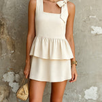 ElevenOra Chic Elegant Beige Cotton-Linen Blend Square-Neck Sleeveless Bow-Tie Detail Ruffled Hem A-Line Mini Dress