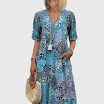 Rikkie | Elegant Floral Midi Dress