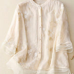 Adelyn | Chic Blouse with Floral Accents