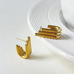 Lustrous Curved Ribbed Gold Earrings