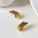 Lustrous Curved Ribbed Gold Earrings