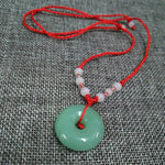 Graceful Jade Disc Pendant