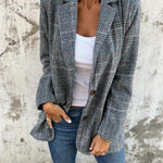 Stella – Timeless Confidence in a Classic Checked Coat