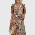 Rikkie | Elegant Floral Midi Dress
