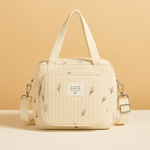 Quilted baby travel bag with insulated interior | Harper